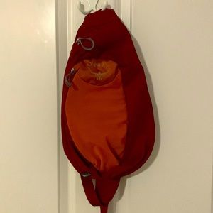 Osprey Sling backpack Maroon and Orange